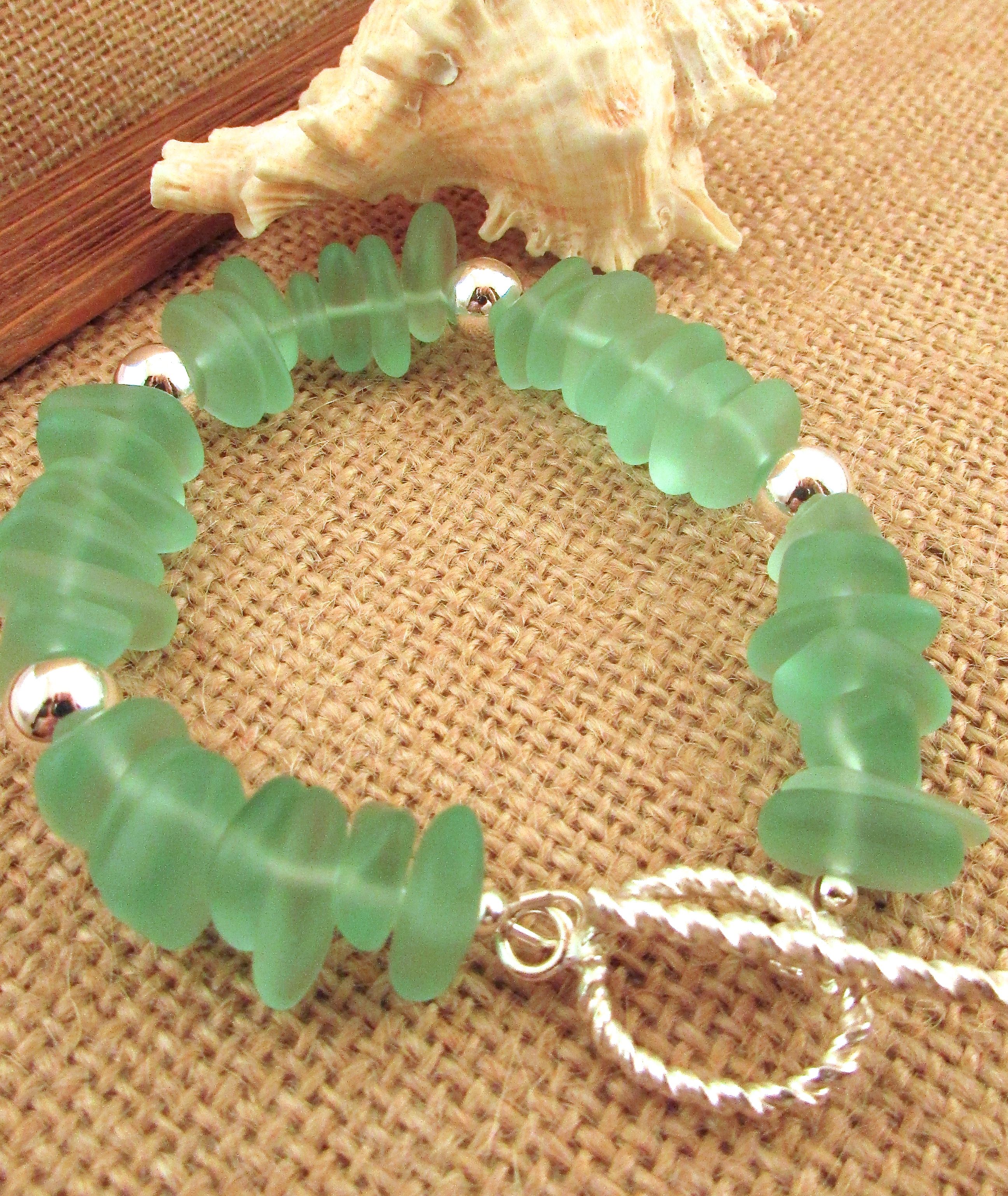 $77 Sea glass nuggets and silver 17B07