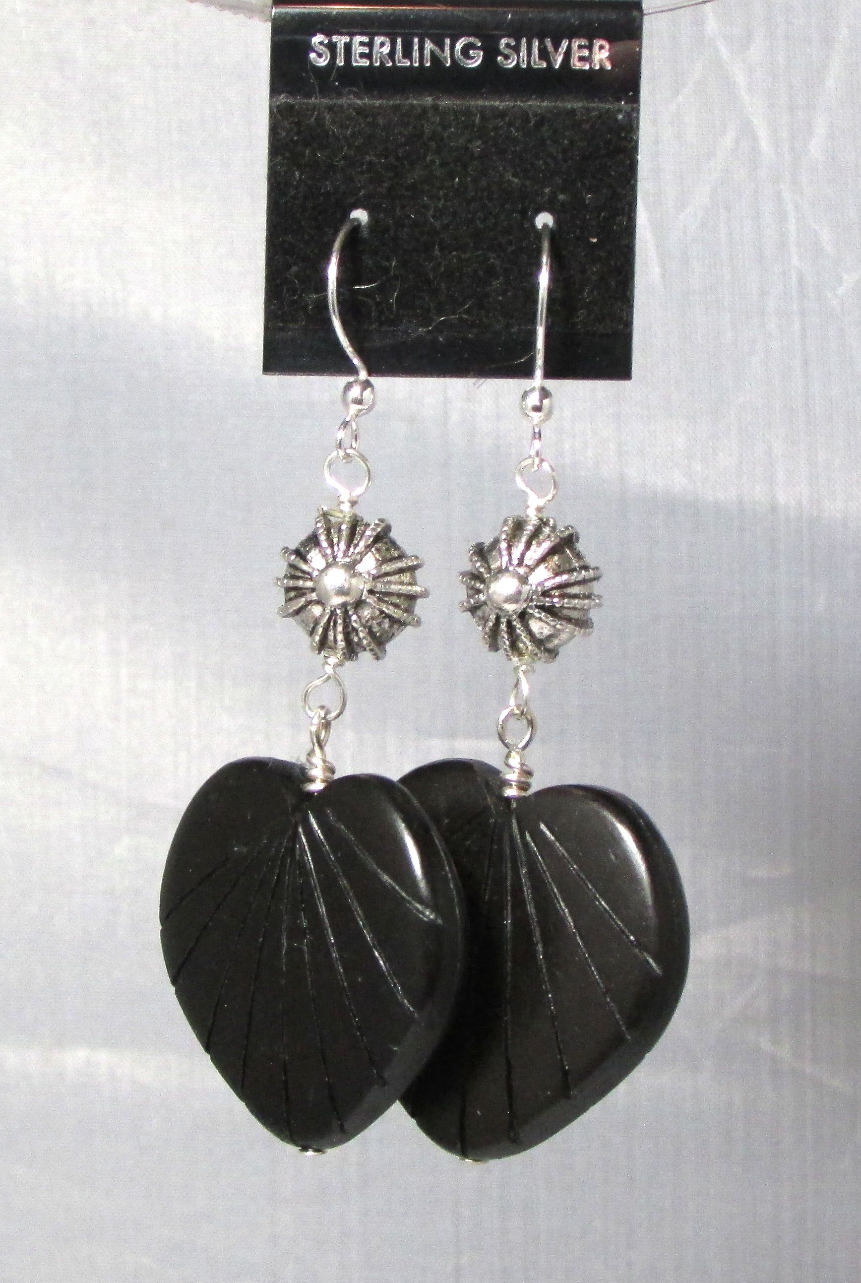 $30 Black carved nut on Silver