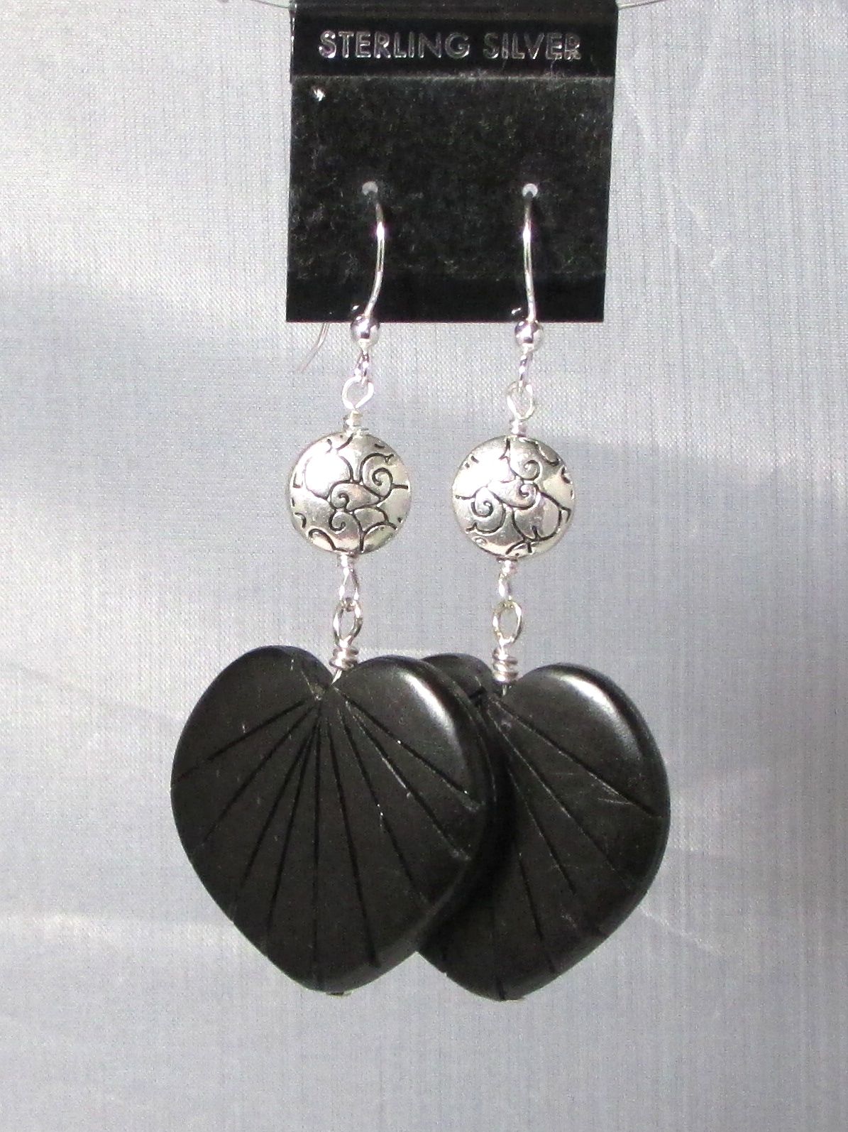 $30 Black carved nut on Silver swirl